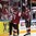 COLOGNE, GERMANY - MAY 6: Latvia's Miks Indrasis #70 celebrates with Roberts Bukarts #71 and the fans after scoring a third period goal against Denmark during preliminary round action at the 2017 IIHF Ice Hockey World Championship. (Photo by Andre Ringuette/HHOF-IIHF Images)

